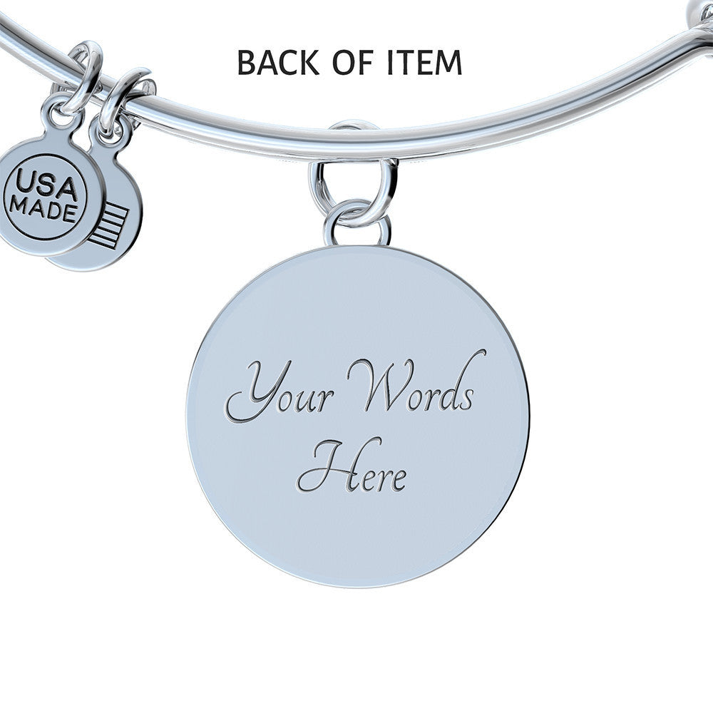 Surprise your granddaughter with this Luxury Bangle Bracelet.  You can engrave onto the back of the pendant your granddaughter's name, your wedding date, an anniversary, or anything else you want to remember. Makes truly unique piece that she'll cherish for years to come!