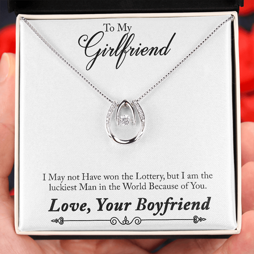 This pendant necklace signifies how lucky you are to have that special someone in your life. This necklace is sure to make her feel recognized! A dancing center Cubic Zirconia is suspended from two fine points and is designed so as to not touch the skin but continually move in a vibrating fashion. 