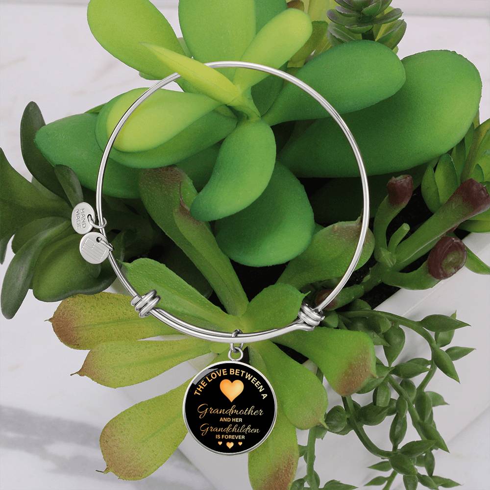 Surprise your granddaughter with this Luxury Bangle Bracelet.  You can engrave onto the back of the pendant your granddaughter's name, wedding date, anniversary, or anything else you want to remember. It makes a truly unique piece that she'll cherish for years!