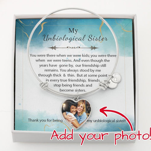 Show your unbiological sister how much she means to you by giving her this Bangle Bracelet. Engrave onto the back of the pendant your Sister's name, your wedding date, an anniversary, BFF birthday wishes, or anything else you want to remember. She'll cherish it for years to come!